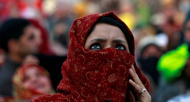Мусульманска яженщина. Фото REUTERS/Danish Ismail Мусульманска яженщина. Фото REUTERS/Danish Ismail