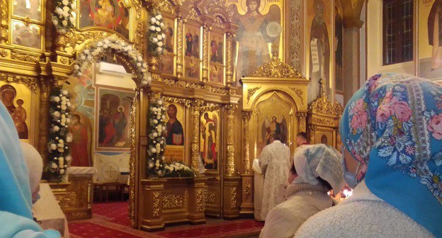Служба в храме Михаила Архангела в Сочи, 7 января 2021 года. Фото Светланы Кравченко для "Кавказского узла". Служба в храме Михаила Архангела в Сочи, 7 января 2021 года. Фото Светланы Кравченко для "Кавказского узла".