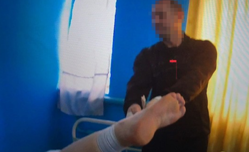 Стоп-кадр видео пыток. Правозащитный проект Gulagu.net